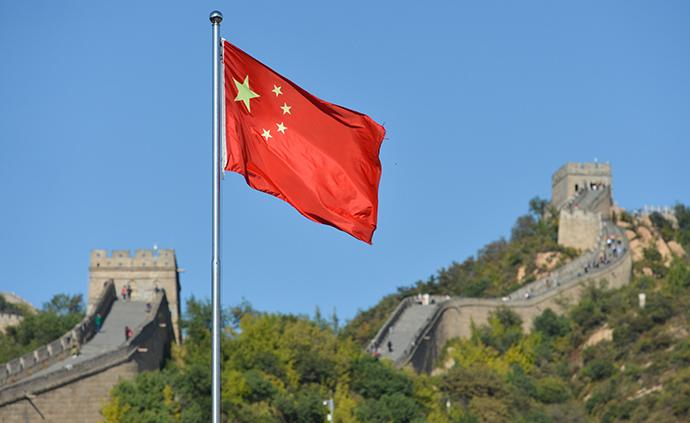 人民日报评论员:中国力量中国精神中国效率的集中展现