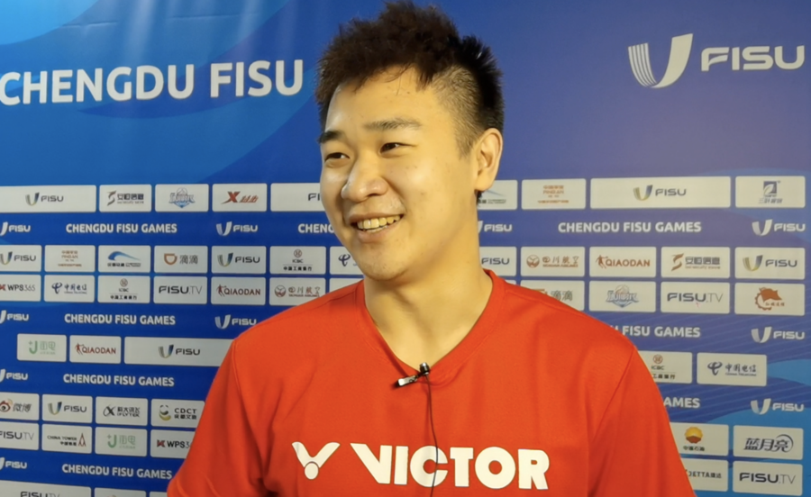 Tan Qiang gives an interview to Xinhua.