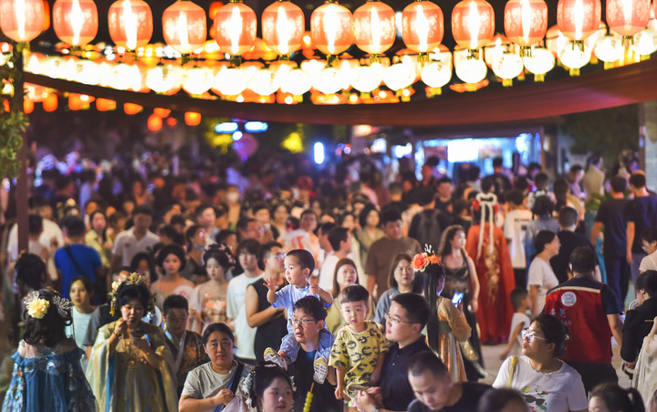 Tourists visit the Luoyi ancient city in Luoyang, central China's Henan Province, Sept. 16, 2024. (Photo by Huang Zhengwei/Xinhua)