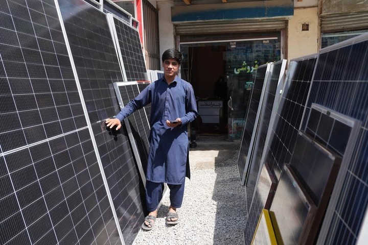 A shop owner checks solar panels at a solar equipment store in Kabul, Afghanistan, July 29, 2026. (Photo by Saifurahman Safi/Xinhua) ab28053bc24d1110235906575a3617e6.jpeg
