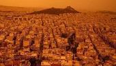 希腊雅典遭撒哈拉沙尘侵袭 天空变成橙黄色