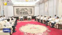 赵一德赵刚与中国兵器工业集团董事长周治平一行座谈